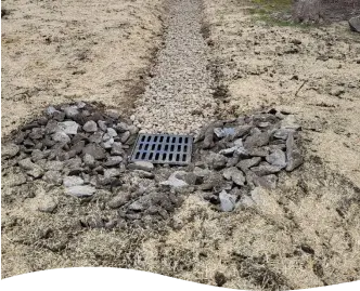 Catch basin with rock path