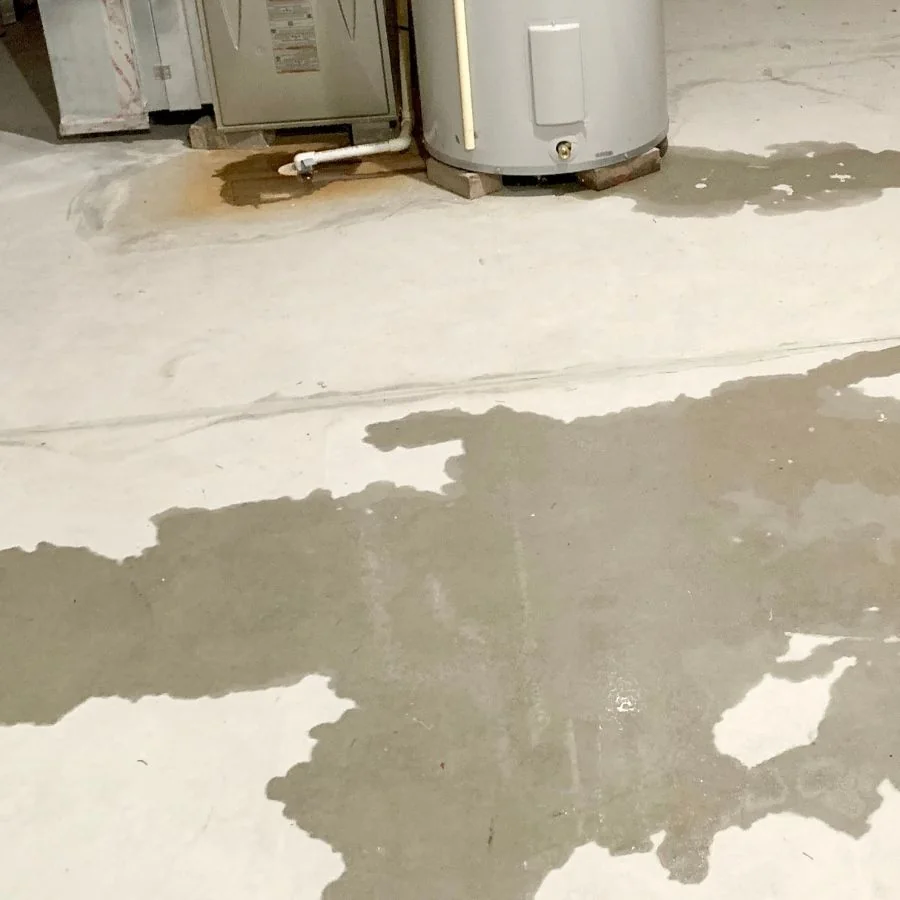 Basement water leak on concrete flooring